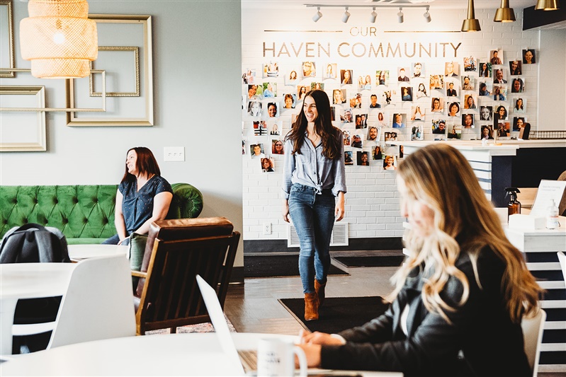 Coworkers working at Haven Collective Upper Arlington in the Lounge.