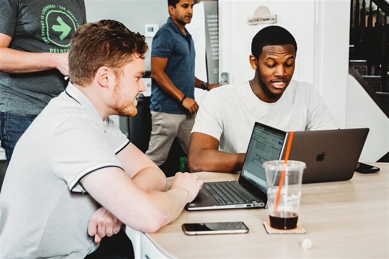 members collaborating in the large office at the haven collective mansion in downtown columbus
